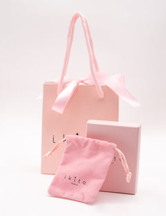 Packaging : Boîte avec pochon + SAC cartonné